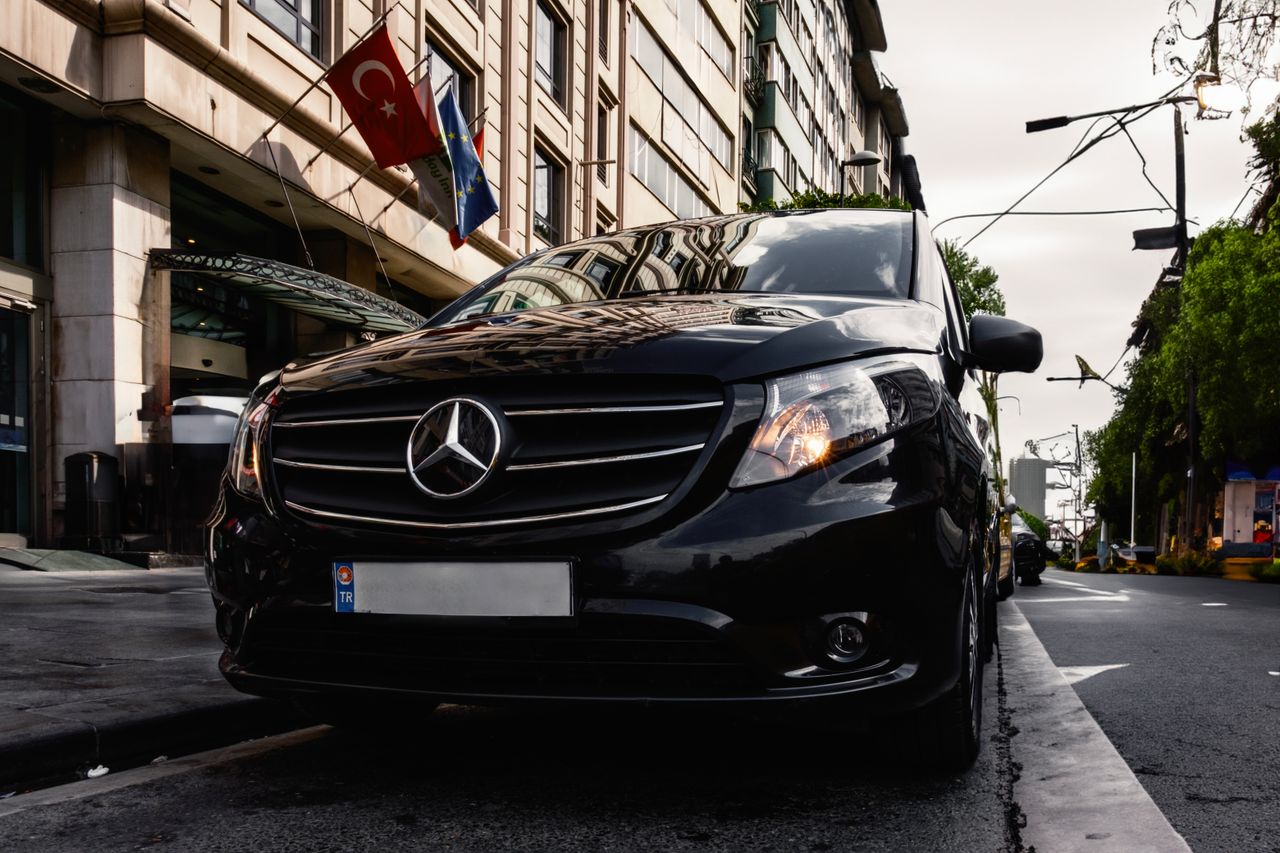 The Art of Drawing Readers In: Your attractive post title goes here Luxury black Mercedes-Benz Vito parked on a Turkish city street, capturing urban elegance.